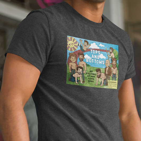 Person wearing a dark gray t-shirt with a colorful graphic design saying tops and bottom on a blurred background