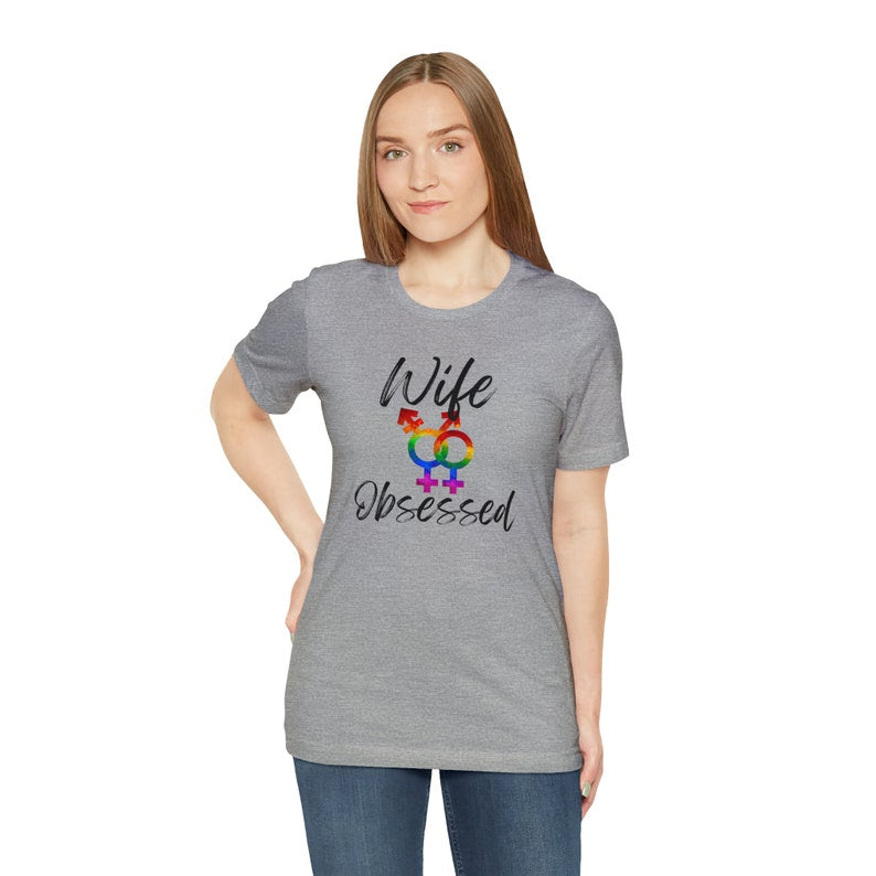 Wife Obsessed Pride Tee. Featuring the non-binary female gender symbol
